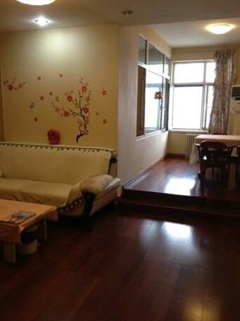 Qingdao Aikejia Apartment - Photo2