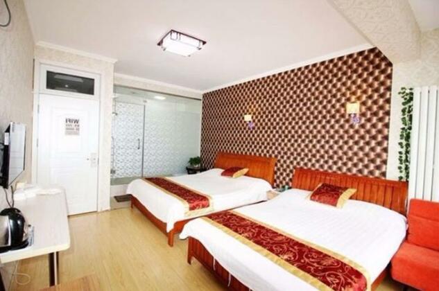Qingdao Charm Space Seaview Apartment - Photo2