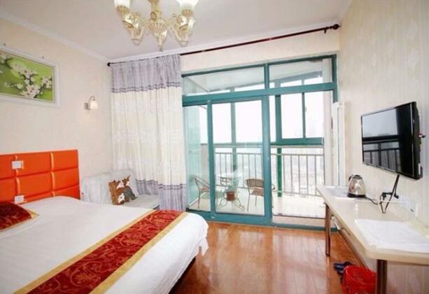 Qingdao Charm Space Seaview Apartment - Photo3