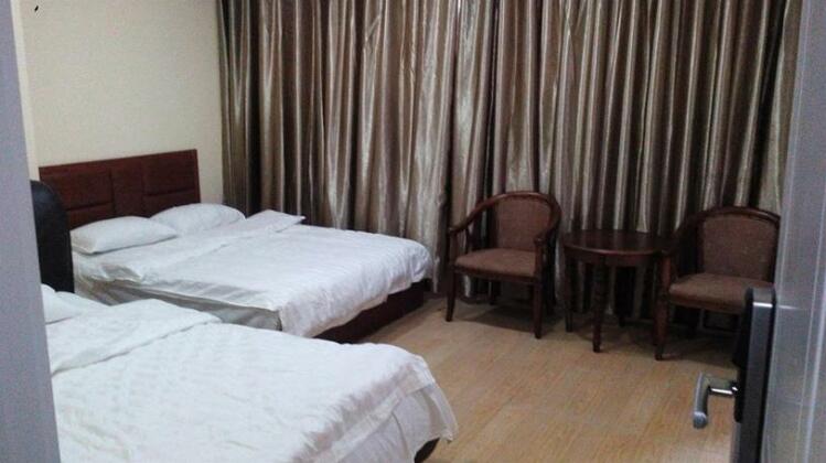 Qingdao Cow Cow Inn - Photo4