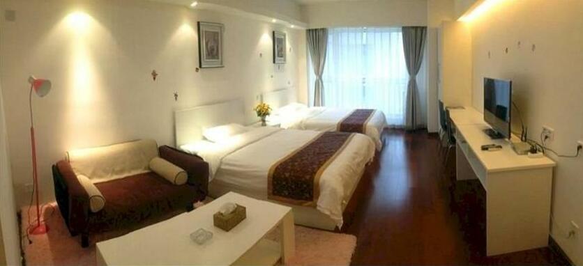 Qingdao Dusco Vacation Apartment - Photo2