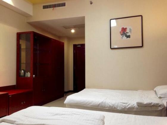 Qingdao Excalibur Hotel - Photo4