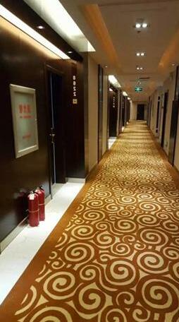 Qingdao Ge Xin Hotel - Photo3