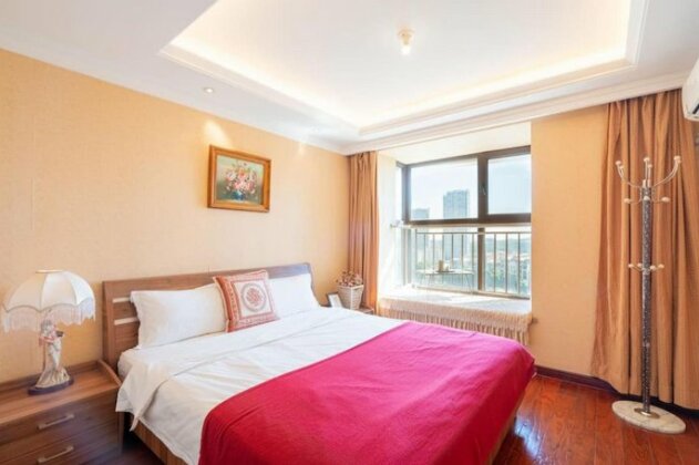 Qingdao Getoom Golden Beach Apartment - Photo4