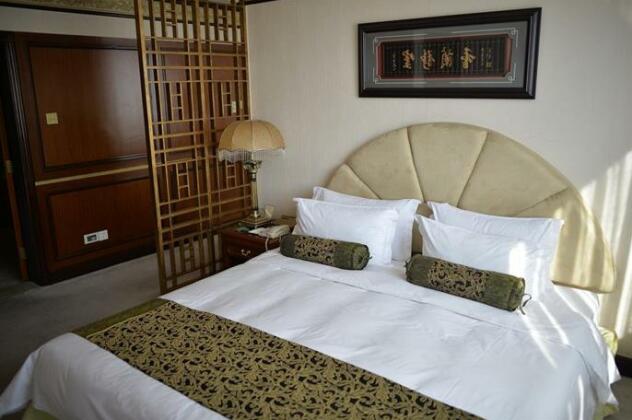 Qingdao Harvest Hotel - Photo4