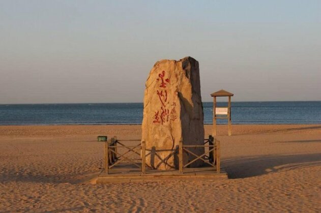Qingdao Jinshatan Apartment - Photo4