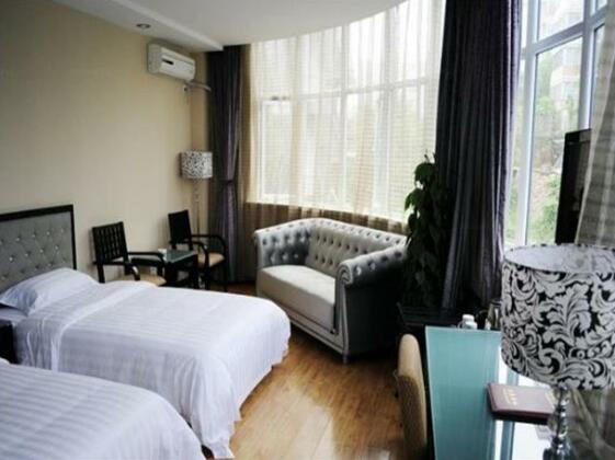 Qingdao Sheng Shi Business Hotel - Photo3