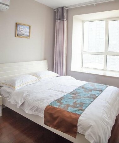 Qingdao SSC International Apartment Hotel - Photo3