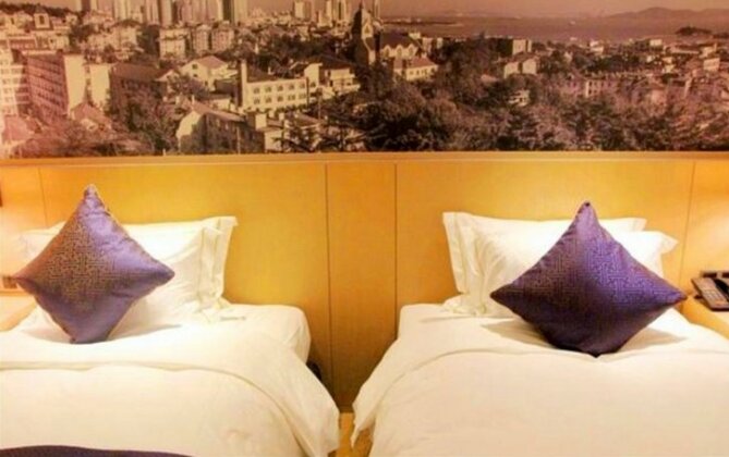 Sky World Hotel Qingdao - Photo5