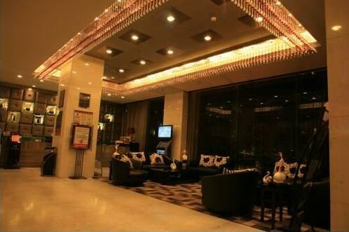 Sunny World Hotel Qingdao - Photo2