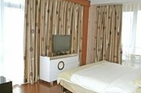 Super 8 Hotel Qingdao Kuilung - Photo2