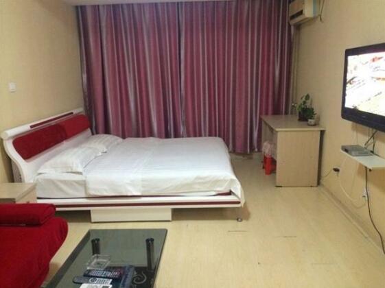 Wanda Gold Dragon Holiday Apartment - Photo3