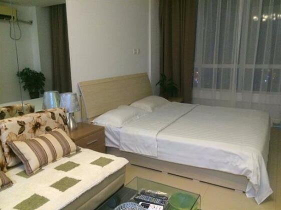 Wanda Gold Dragon Holiday Apartment - Photo5