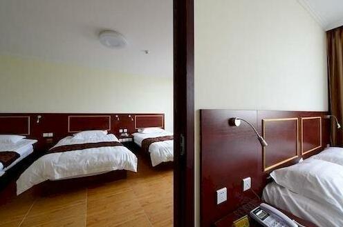 Xinshijia Business Hotel - Photo2