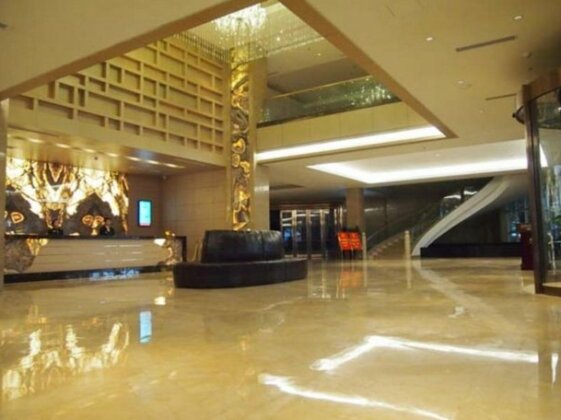 Huang Ma Holiday Hotel - Photo2