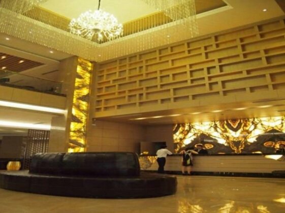 Huang Ma Holiday Hotel - Photo3