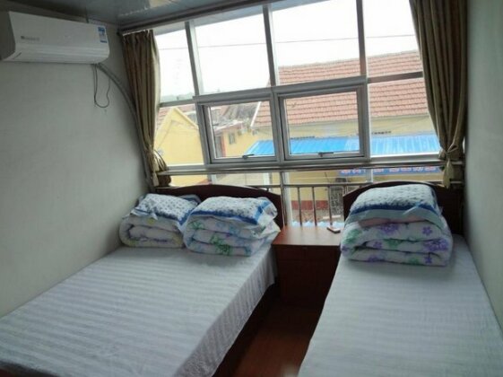 Rizhao Hongqiang Yujia Hotel - Photo4