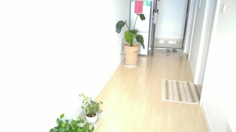 Rizhao Jiafei Apartment - Photo5