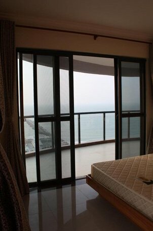 Shanhai yunlong qiwan Seaside Apartment - Photo4