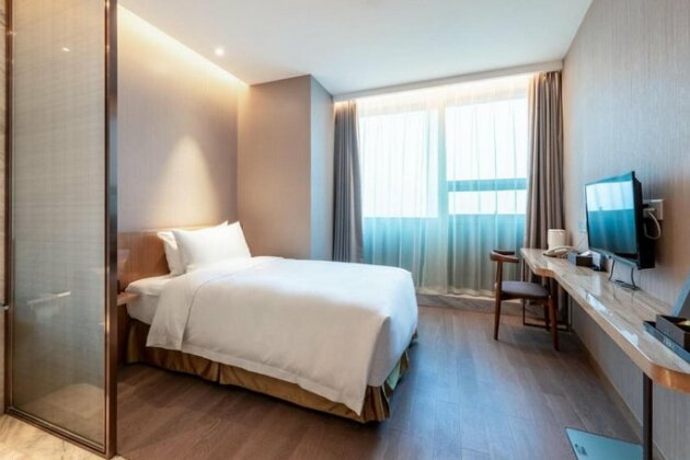 Auto City Ruili Hotel - Photo5