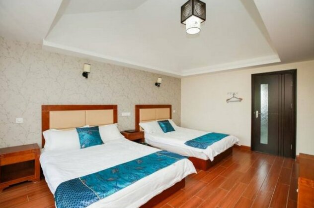 Jixiang Garden Inn - Photo3