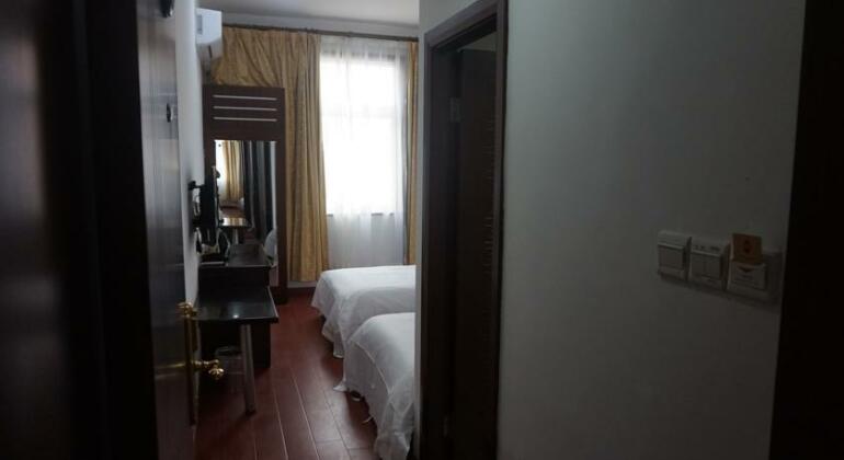 Junhang Holiday Hotel - Photo4