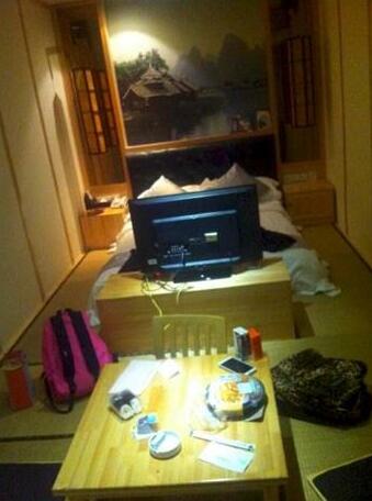 Xingdao Boutique Hotel - Photo4