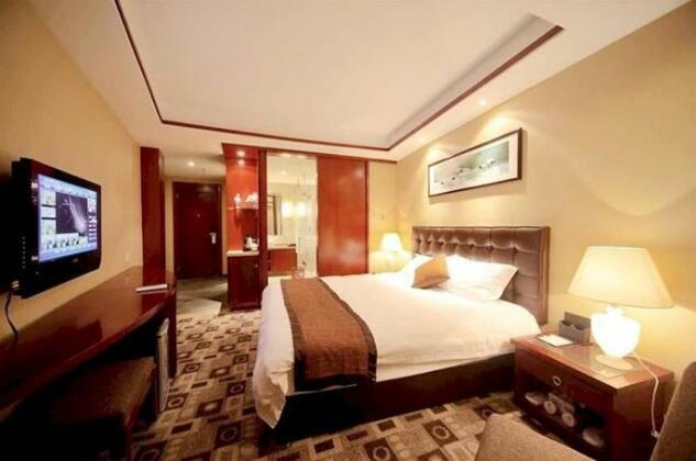 Xingdao Holiday Hotel - Photo4