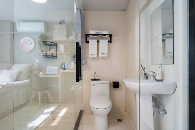 Yi Shi International Apartment Hotel - Photo5