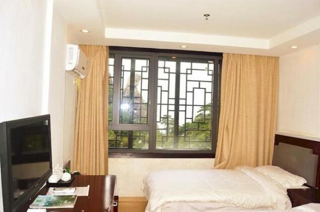 Nvshen Hotel - Photo4
