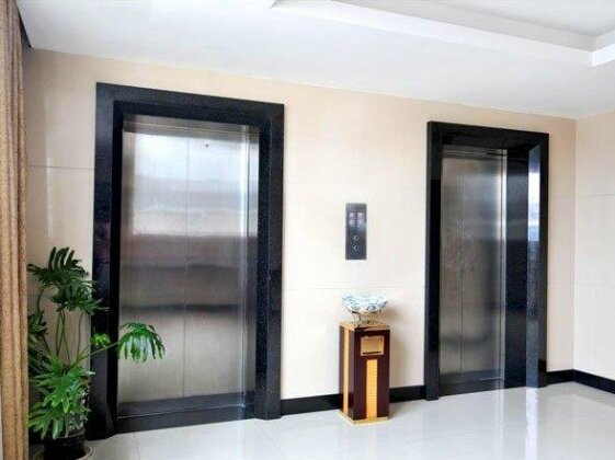 Qing Hua Wu International Hotel - Photo2