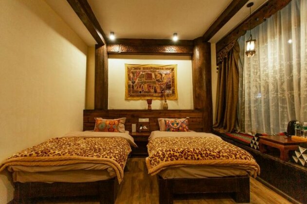 Asha's Inn - Photo4
