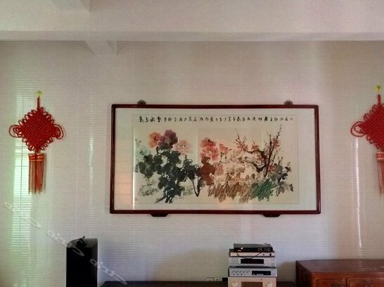 Qing'aowan Zengji Hostel - Photo4
