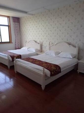 Gouqidao Chunnuan Huakai Homestay - Photo3