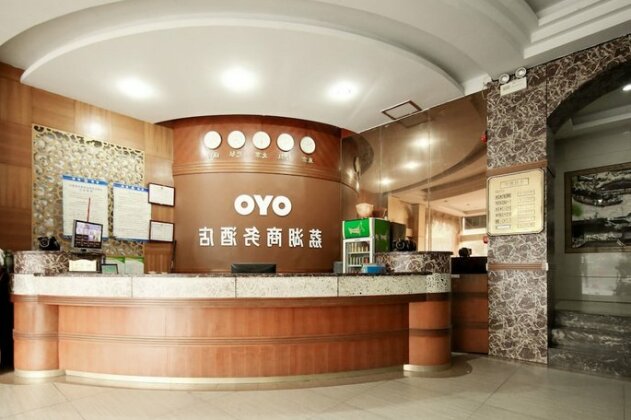 OYO 8027 Li Hu Business Hotel - Photo3