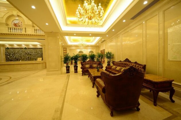 Vienna International Hotel Shajing heyi Branch - Photo4