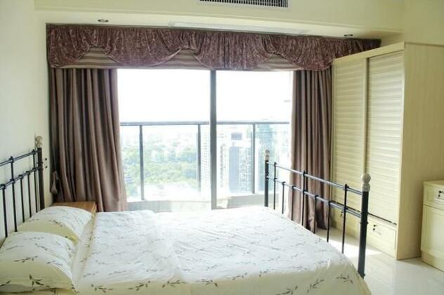 Xingfu Huafu Apartment - Photo2