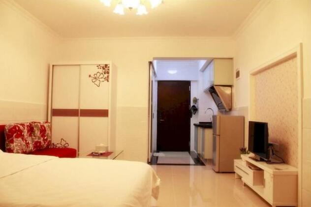 Xingfu Huafu Apartment - Photo4