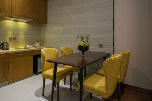 Yimin Gold Olives Apartment - Photo3