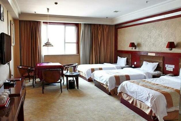 Shi Ji Huang Chao Holiday Hotel - Photo2