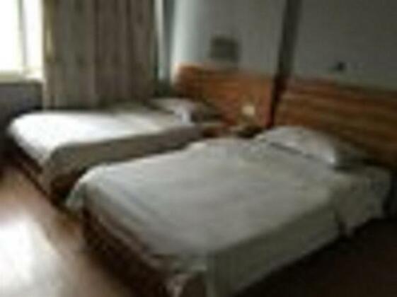 Suqian Siyang Dingfeng Hotel - Photo2