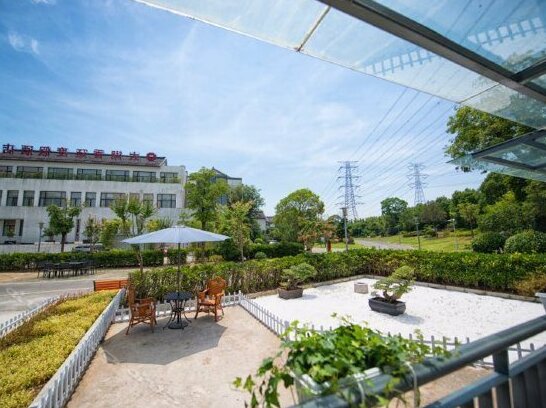 Taihu Xiangyue Theme Inn - Photo4