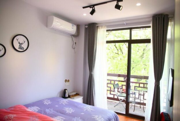 TongLi Weizhi Coffee Hostel - Photo3