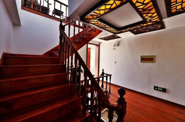 Zhouzhuang Zhenfeng Jiyi Hostel - Photo4