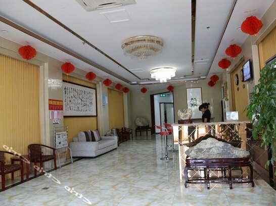 Xinshuanglong Hotel - Photo2