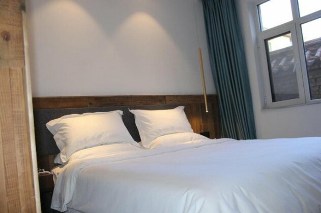 Xunyue Qingshe Hotel - Photo5