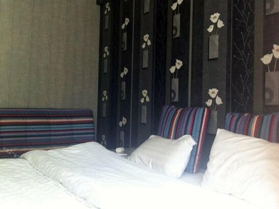 Yuese Holiday Hotel - Photo5