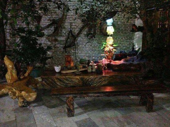 Puzhehei Bigu Jiayuan Hostel - Photo4