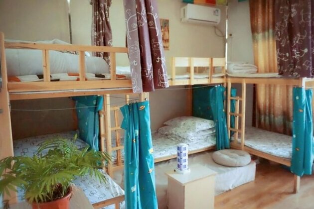 Huanlesong Youth Hostel - Photo2
