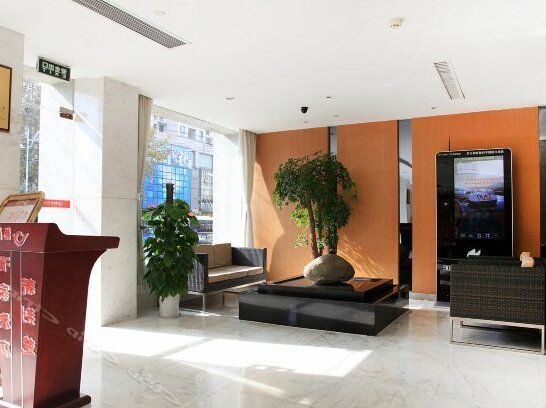 Sunsky New Jingchu Hotel - Photo4